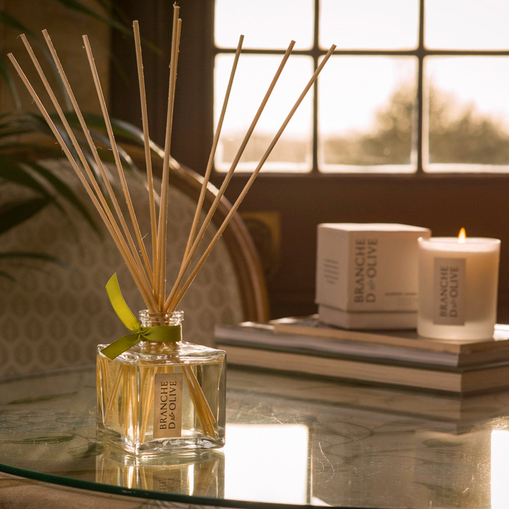 image-diffuser-candles-scented-on-stack-of-books