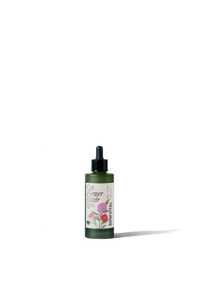 Green bottle with floral design on a white background