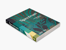 Book titled 'Spectrum' with a decorative cover on a white background