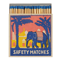 Matchbox open with blue elephant and tree with safety match written on bottom of-image