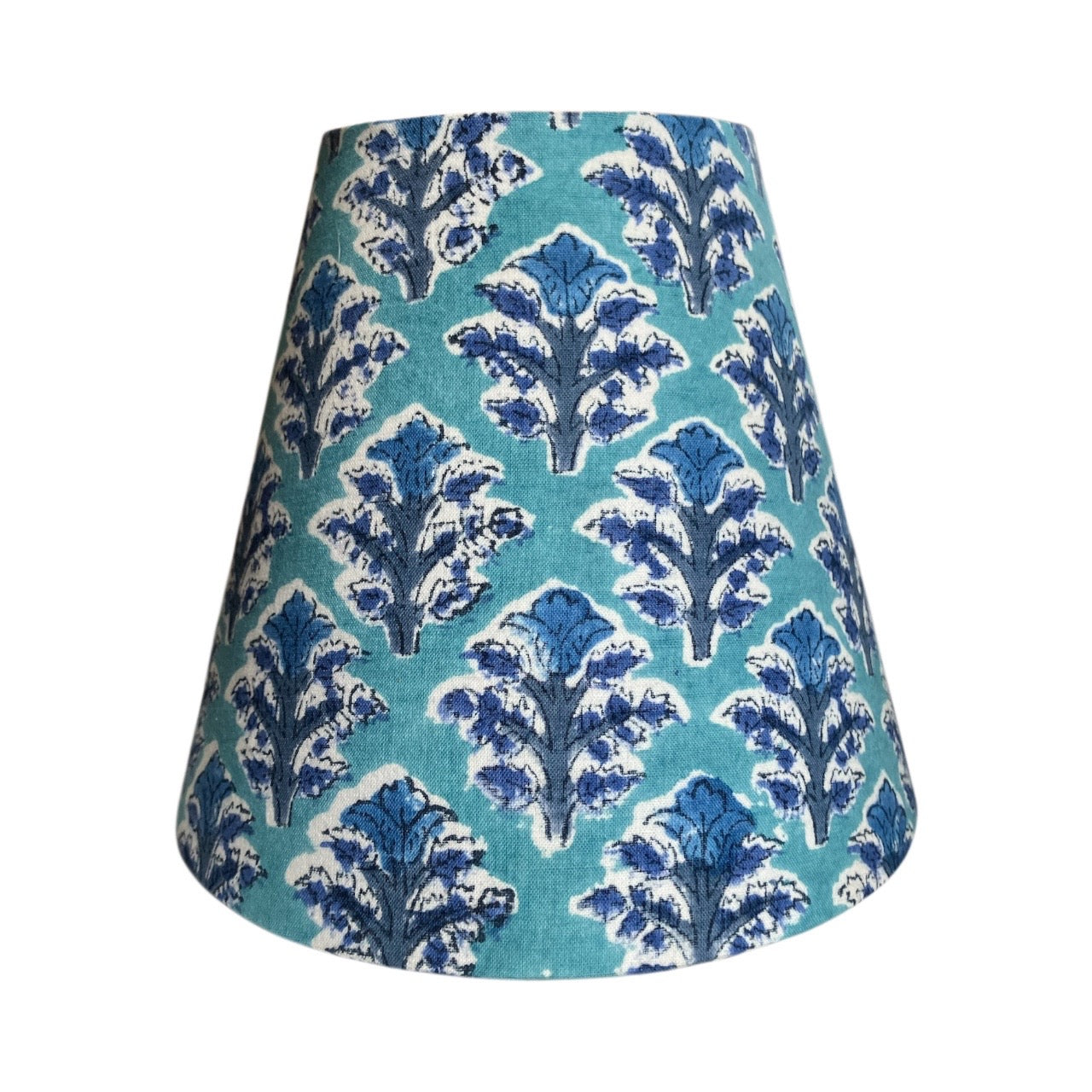 Lampshade with blue floral pattern on a turquoise background