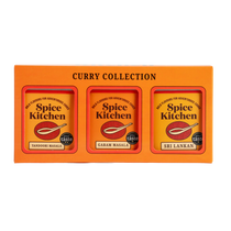 Orange box of Spice Kitchen Curry Collection with three spice packets inside.
