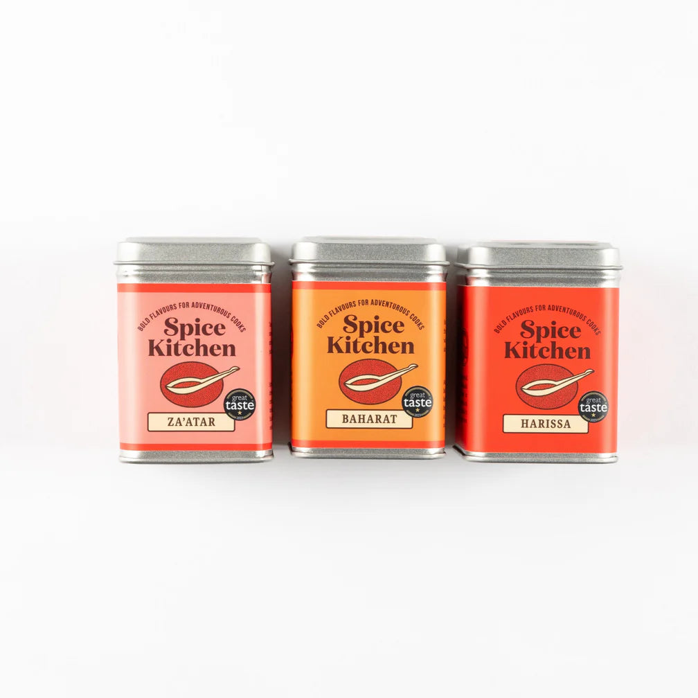 Three Spice Kitchen spice tins on a white background