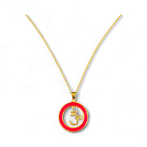 gold chain with pink pendant