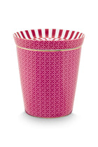 Pink and white modern geometric, striped cup and saucer.