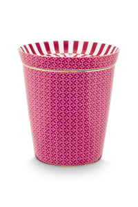 Pink and white modern geometric, striped cup and saucer.