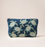 Blue pouch with turtle pattern on a white background